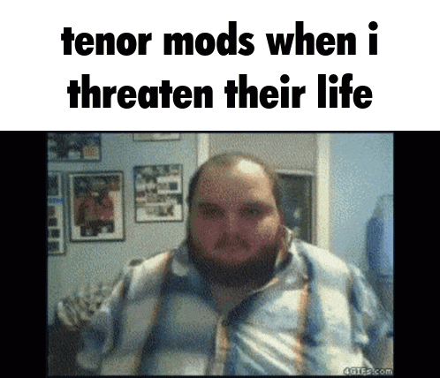 a man with a beard is standing in front of a sign that says tenor mods when i