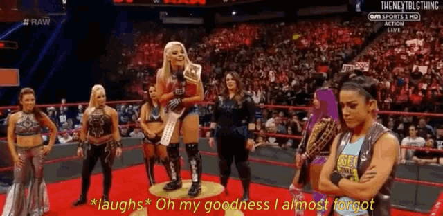 a group of women are standing around a podium and one of them says " laughs "