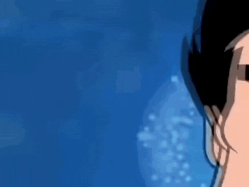 a close up of a person 's face against a blue background with bubbles coming out of it .