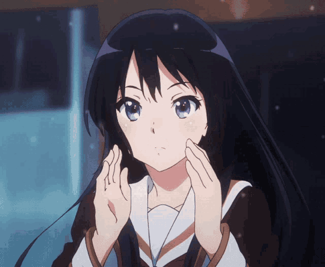 a girl with long black hair and purple eyes looks at the camera