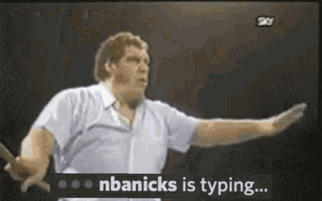 a man in a white shirt says nbanicks is typing on a screen