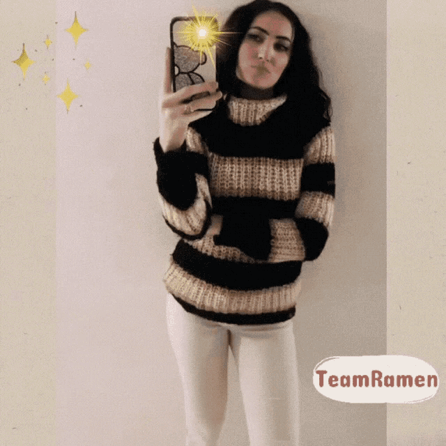 a woman in a striped sweater takes a selfie with a teamramen logo in the corner