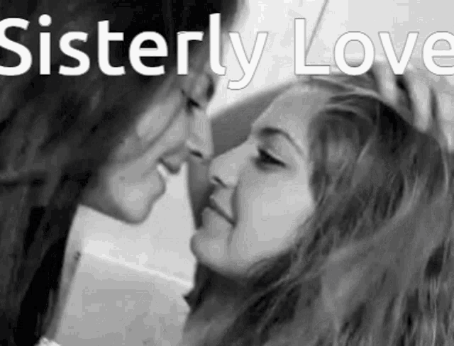 two women are kissing each other in a black and white photo with the words sisterly love written above them .
