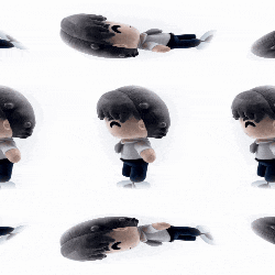 a bunch of stuffed dolls with different facial expressions