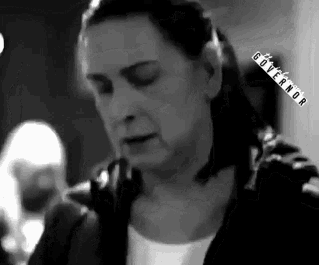 a black and white photo of a woman with the word governor on the bottom right