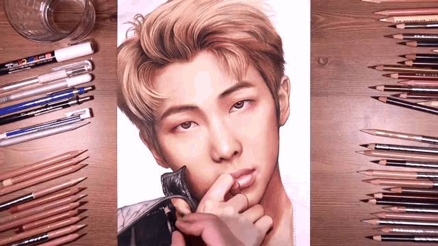 a drawing of a man surrounded by colored pencils