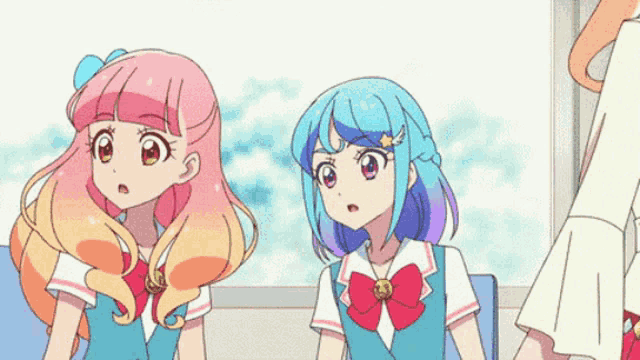 two anime girls are standing next to each other and one has blue hair