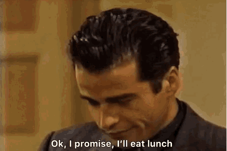 a man in a suit and tie is saying `` ok , i promise i 'll eat lunch '' .