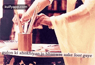 a woman in a white dress is holding a pencil in a container .