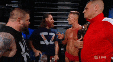 a group of men are standing next to each other and one of them is wearing a shirt that says " sigma "