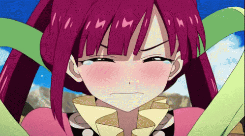 a close up of a girl with purple hair making a face