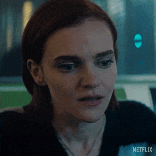 a close up of a woman 's face with the word netflix on the bottom