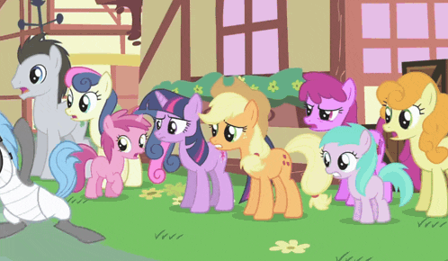 a group of ponies are standing in a row and one of them has a purple mane