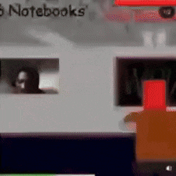 a blurred image of a laptop with the word notebooks on the top