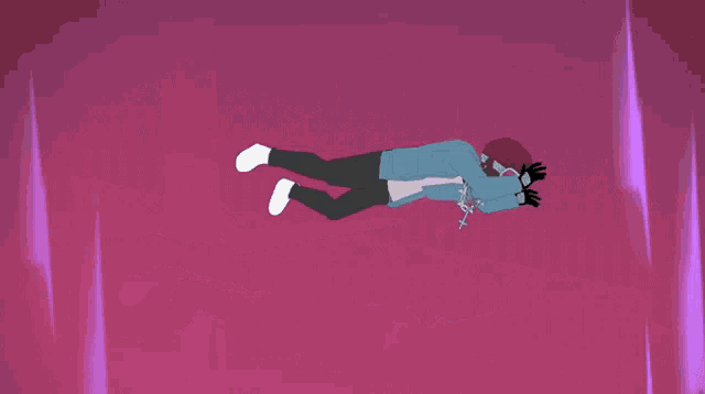a person in a blue jacket is laying on their back