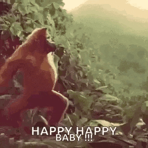 a monkey is standing in the woods with the words `` happy happy baby '' written on it .