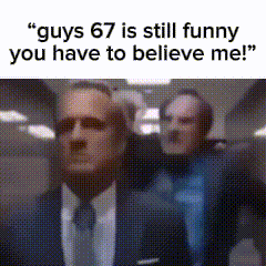 a man in a suit and tie is standing next to another man in a suit and tie .