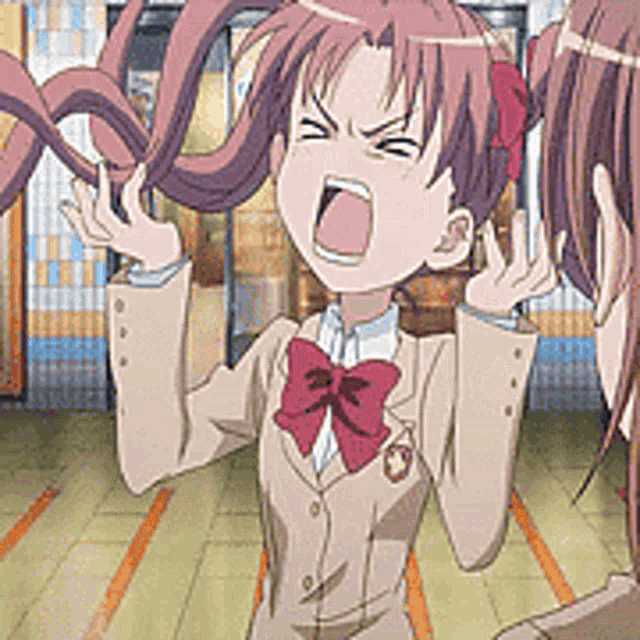 a girl in a suit and bow tie is screaming