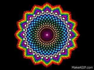 a rainbow colored circular pattern on a black background with the website makeagif.com at the bottom