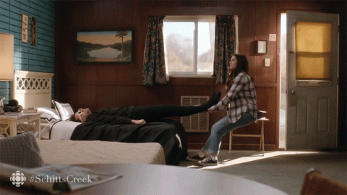 Get Out Of Bed Emily Hampshire GIF - Get Out Of Bed Emily Hampshire Dan Levy GIFs