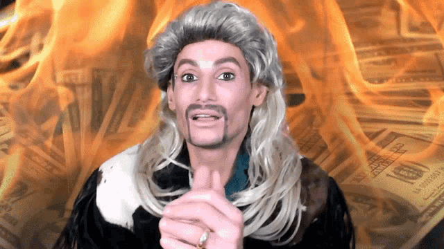 a man in a wig is standing in front of a pile of money that says one hundred dollars