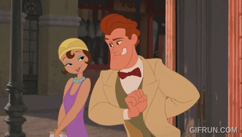 a man and a woman are standing in front of a building with the number 70