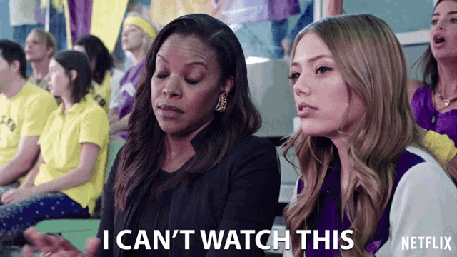 a netflix ad shows two women sitting in a crowd