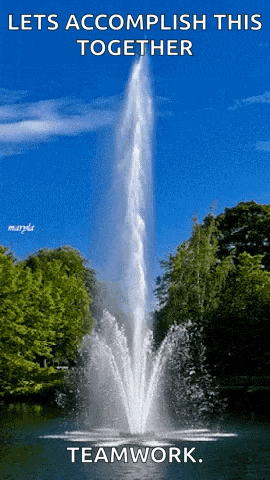 a fountain with the words let 's accomplish this together teamwork written on it