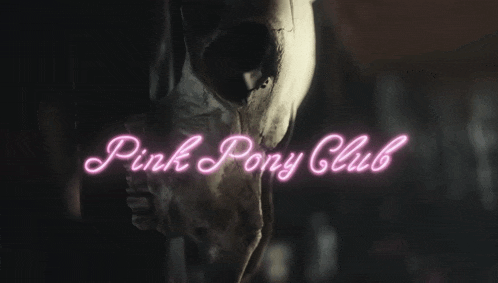 a pink neon sign with a horse and the words pink pony club on it
