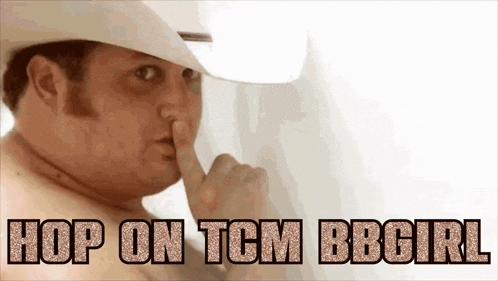 a shirtless man in a cowboy hat is covering his mouth with his finger and says hop on tcm bbcirl