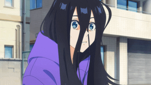 a girl with long black hair has a purple hoodie on