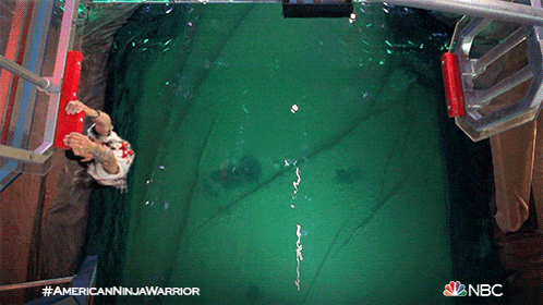 an advertisement for american ninja warrior shows a man swimming in a pool