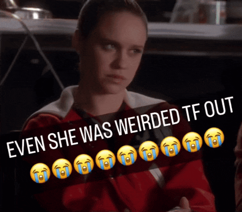 a woman in a red jacket with tears in her eyes and the words even she was weirded tf out