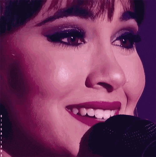 a close up of a woman 's face with the name rosa written on the bottom