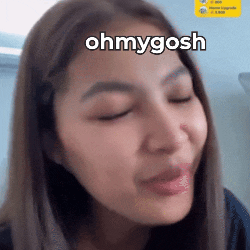 a close up of a woman 's face with the words ohmygosh above her