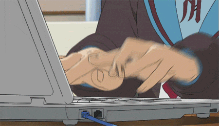a person is typing on a laptop with a shirt that says jh