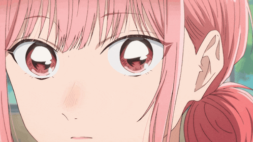 a close up of a pink haired anime girl 's eyes