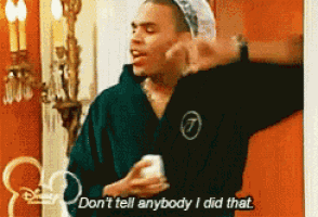 a man says " don 't tell anybody i did that " while holding a cup