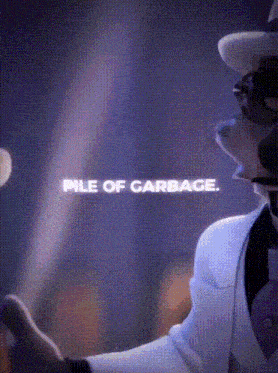 a man in a suit and hat is standing in front of a pile of garbage