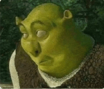 shrek from shrek is making a funny face while looking at the camera .
