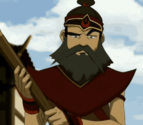 a man with a beard is holding a stick and wearing a helmet .