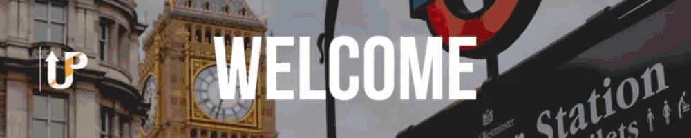 a welcome sign with a big ben clock in the background