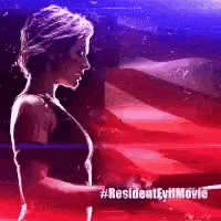 a woman is holding a gun in front of a red white and blue flag .