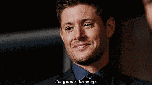 a man in a suit and blue shirt is saying i 'm gonna throw up