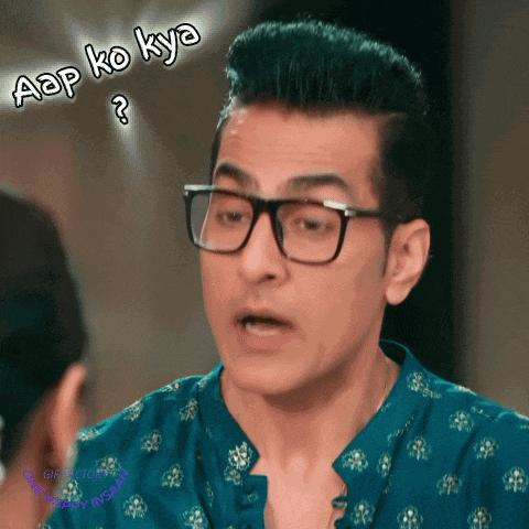 a man wearing glasses and a blue shirt says aap ko kya ?