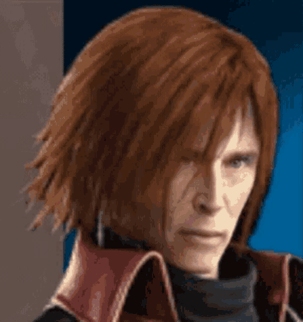 a close up of a man 's face with red hair and a black jacket .