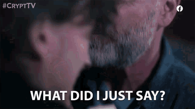 a man with a beard is kissing a woman and says `` what did i just say ? ''
