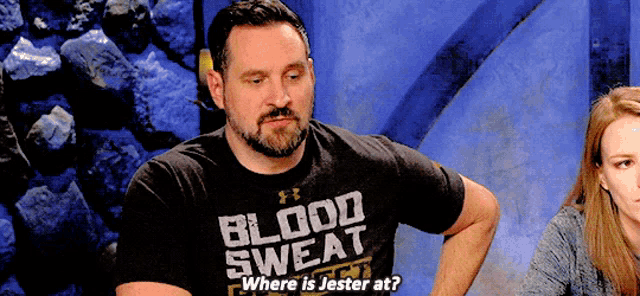 a man wearing a black shirt that says blood sweat is asking where jester is