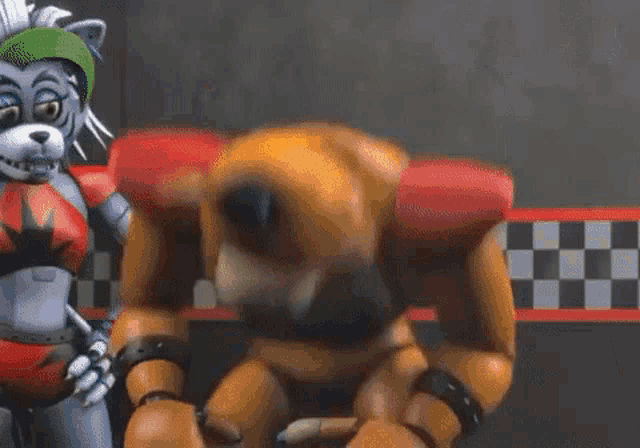 a robotic teddy bear is standing next to a robotic cat .