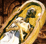 a statue of a mummy in a coffin with the lid open